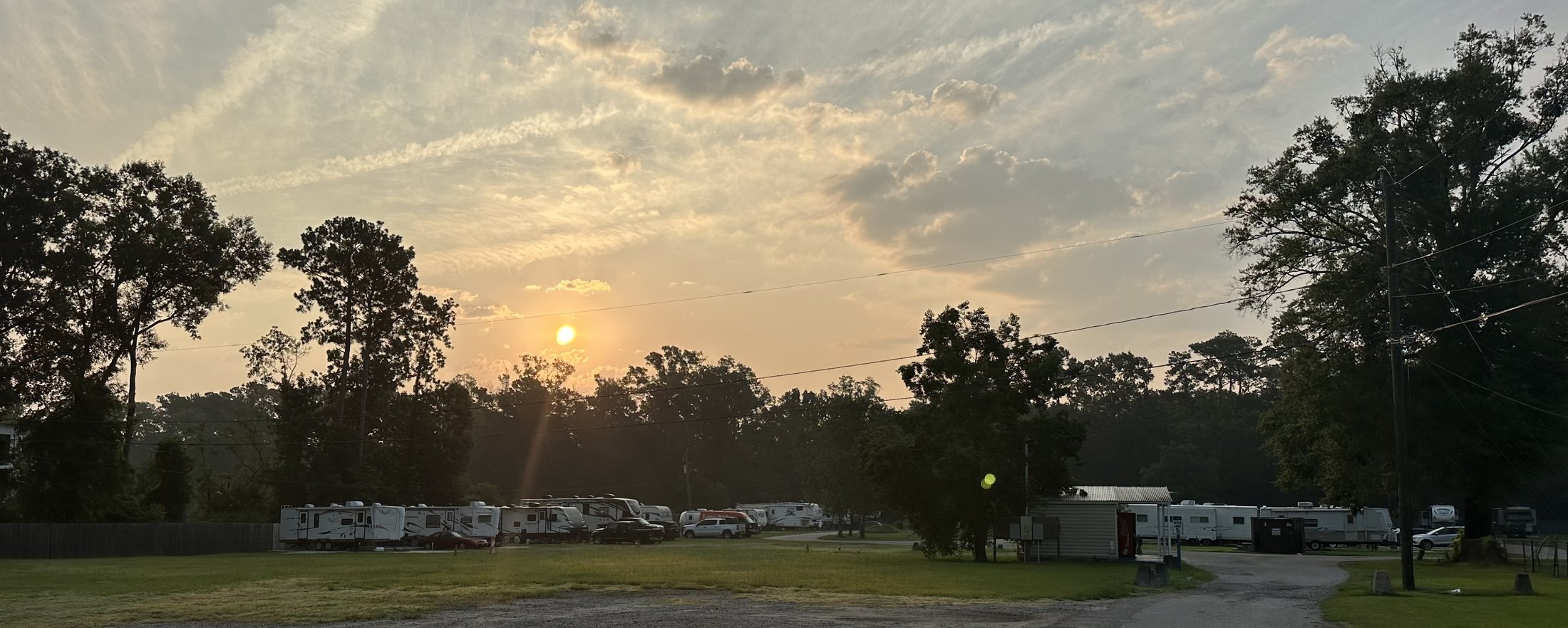 Wide sunrise view across Sunshine R.V. Park
